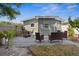 Inviting backyard patio offers a perfect spot for outdoor dining and entertaining at 5758 20Th N Ave, St Petersburg, FL 33710