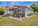 Charming single-story home featuring updated landscaping, well-maintained lawn and freshly painted exterior at 5758 20Th N Ave, St Petersburg, FL 33710