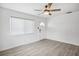 Bright living room featuring updated flooring and fixtures, seamlessly connecting to the adjacent spaces at 5758 20Th N Ave, St Petersburg, FL 33710