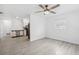 Bright living room featuring updated flooring and fixtures, seamlessly connecting to the adjacent spaces at 5758 20Th N Ave, St Petersburg, FL 33710