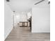 Bright living room featuring updated flooring and fixtures, seamlessly connecting to the adjacent spaces at 5758 20Th N Ave, St Petersburg, FL 33710