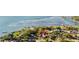 Tranquil waterfront community boasts lush landscaping, private docks, and serene water views, an ideal setting for coastal living at 6305 Bahama Shores S Dr, St Petersburg, FL 33705