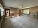 Open living room features tile floors, with renovations underway, showing great potential at 6305 Bahama Shores S Dr, St Petersburg, FL 33705