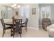 Bright dining room with tile floors and ample natural light at 689 Chipper Dr, Sun City Center, FL 33573