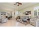 Spacious living room with large windows and natural light at 689 Chipper Dr, Sun City Center, FL 33573