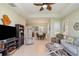 Comfortable living room with neutral walls and an open floor plan at 689 Chipper Dr, Sun City Center, FL 33573