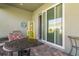 Covered patio with a table and seating, perfect for outdoor enjoyment at 689 Chipper Dr, Sun City Center, FL 33573