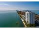 Beautiful aerial view of waterfront condo complex with docks, bridge, and partial views of the Gulf at 7200 Sunshine Skyway S Ln # 3D, St Petersburg, FL 33711