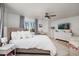 Spacious bedroom featuring a large bed, dresser, and plenty of natural light at 7200 Sunshine Skyway S Ln # 3D, St Petersburg, FL 33711