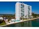 Waterfront building boasts a community pool, tropical landscaping, and expansive water views at 7200 Sunshine Skyway S Ln # 3D, St Petersburg, FL 33711