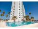 A luxurious pool sits at this high-rise condo building with tropical landscaping at 7200 Sunshine Skyway S Ln # 3D, St Petersburg, FL 33711
