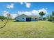Sprawling backyard view of single story home at 7509 Mesa St, North Port, FL 34287
