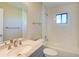 Clean bathroom features modern vanity, tub, shower and fixtures at 7509 Mesa St, North Port, FL 34287