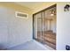 Covered patio with access to living room at 7509 Mesa St, North Port, FL 34287