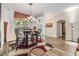 Bright dining area showcasing stylish furnishings and an inviting atmosphere at 9302 Deer Creek Dr, Tampa, FL 33647