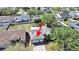 Residential neighborhood aerial view featuring mature landscaping and tree-lined streets at 9711 Wydella St, Riverview, FL 33569