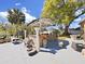 Relaxing backyard patio with a seating area, plants, and shade for outdoor enjoyment at 9711 Wydella St, Riverview, FL 33569