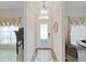 Foyer with decorative tile flooring and a glass front door at 9711 Wydella St, Riverview, FL 33569