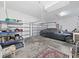 Spacious garage featuring ample storage, parking, and lots of organizational shelving at 9711 Wydella St, Riverview, FL 33569