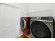 The laundry area shows modern washer and dryer units and wire shelving at 9711 Wydella St, Riverview, FL 33569