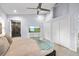 Primary bedroom featuring an en-suite bathroom with a glass shower and double closets at 1039 23Rd St, Sarasota, FL 34234