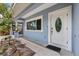 Close-up of front door featuring an oval window and modern hardware at 1039 23Rd St, Sarasota, FL 34234