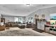Spacious living room with neutral colors and large windows offering plenty of natural light at 10404 Hawk Ct, Riverview, FL 33578