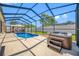 Outdoor view of a pool and hot tub area, perfect for backyard entertaining and relaxation at 12442 Curry Dr, Spring Hill, FL 34609