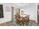 Dining room featuring large table and neutral color scheme at 12442 Curry Dr, Spring Hill, FL 34609