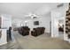 Cozy living room with comfortable leather seating and an open layout, perfect for relaxation and gatherings at 12442 Curry Dr, Spring Hill, FL 34609