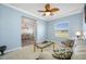 Comfortable living room with a view into the dining room, offering a relaxed atmosphere at 12442 Curry Dr, Spring Hill, FL 34609