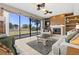 Comfortable living room with fireplace and great backyard view at 12929 Prestwick Dr, Riverview, FL 33579
