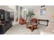 Bright living room featuring neutral walls, plush carpeting, and elegant furnishings at 12929 Prestwick Dr, Riverview, FL 33579