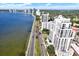 Stunning aerial view of high-rise apartments along the waterfront under a clear sky at 1301 S Howard Ave # B24, Tampa, FL 33606