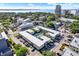 Aerial view of community with lush landscaping, parking, and views of the bay at 1301 S Howard Ave # B24, Tampa, FL 33606