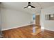 This bedroom features sleek hardwood floors, a ceiling fan and an AC unit for comfort at 1301 S Howard Ave # B24, Tampa, FL 33606