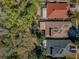 Aerial top-down view of neighborhood homes showing roof types and tree coverage at 15925 Pond Rush Ct, Land O Lakes, FL 34638
