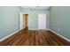 Bedroom with hardwood floors at 15925 Pond Rush Ct, Land O Lakes, FL 34638