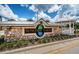 Community entrance sign for Suncoast Lakes with lush landscaping and a gazebo at 15925 Pond Rush Ct, Land O Lakes, FL 34638