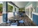 Community pool cabana featuring tables and chairs on brick patio at 15925 Pond Rush Ct, Land O Lakes, FL 34638