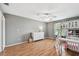 Inviting bedroom with wood floors, lots of natural light, and a bunk bed at 16064 Dawnview Dr, Tampa, FL 33624