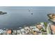 Wide aerial view of waterfront community, showcasing the idyllic location and beautiful Tampa Bay backdrop at 200 Driftwood W Dr, Palm Harbor, FL 34683