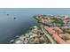 Beautiful aerial view of waterfront homes with stunning views and docks for convenient boating access at 200 Driftwood W Dr, Palm Harbor, FL 34683