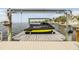 Modern boat lift providing secure storage and easy access to the open water at 200 Driftwood W Dr, Palm Harbor, FL 34683