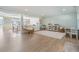 Spacious bonus room with an open floor plan, showcasing stylish decor and an abundance of natural light at 200 Driftwood W Dr, Palm Harbor, FL 34683