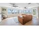 Inviting living area with water views, comfortable seating, and lots of natural light at 200 Driftwood W Dr, Palm Harbor, FL 34683