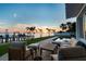 Relaxing patio and pool area overlooking the water and boat dock at 200 Driftwood W Dr, Palm Harbor, FL 34683