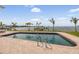 Inviting pool with bay view, perfect for entertaining and relaxing at 200 Driftwood W Dr, Palm Harbor, FL 34683