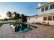 Backyard pool, patio and backyard oasis of this beautiful two-story home at 200 Driftwood W Dr, Palm Harbor, FL 34683