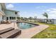 Gorgeous waterfront pool offering stunning views and direct access to the bay at 200 Driftwood W Dr, Palm Harbor, FL 34683